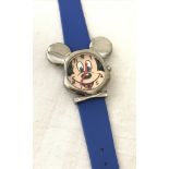 A blue strap Mickey for Kids wristwatch with head Mickey Mouse head shaped case.