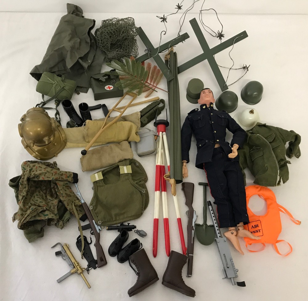 An original 1964 Palitoy Action Man together with assorted uniforms & accessories.