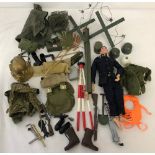 An original 1964 Palitoy Action Man together with assorted uniforms & accessories.