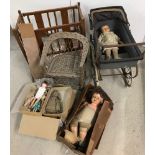 A collection of vintage and antique dolls and accessories.