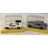 2 boxed Dinky sports cars.