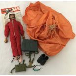 A vintage 1964 Red devils Action Man with outfit, accessories and pamphlet.