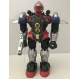 A vintage illuminated Fire Fire toy robot in red, grey and silver colours.