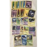 A collection of 50 1990's Pokémon energy cards together with 13 Pokémon playing cards from 2007