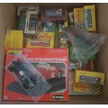 A box of boxed diecast with a few unboxed.