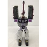 A 2001 Hasbro Inc Transformers Decepticon figure of "Galvatron", tank toy.