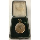 A 14ct gold ladies pocket watch case with floral decoration to face.