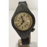 An early Niello automobile racing wristwatch with original period leather strap and buckle.