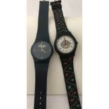 2 Alcohol advertising modern watches. Martini and Harp larger.