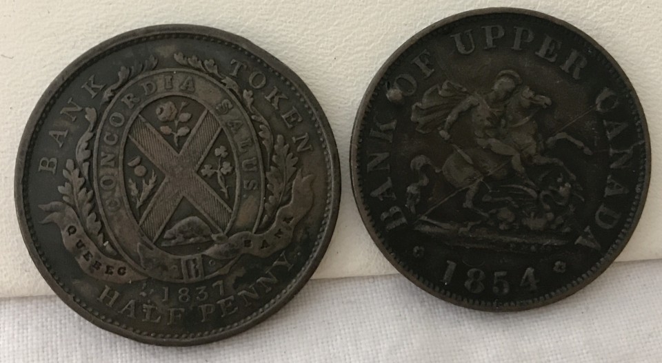 2 x Canadian half penny copper bank tokens.