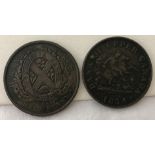 2 x Canadian half penny copper bank tokens.