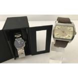 A gents FCUK 5 atm wristwatch together with a boxed gents FHM Collections wristwatch