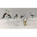 A collection of Murano glass birds and kangaroo.