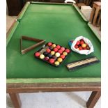An 8ft snooker table.