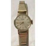 A vintage ladies Girard Perregaux Swiss made wristwatch on gilt expandable strap.