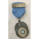 Orders and Medals Society of America award on blue ribbon with pin badge.