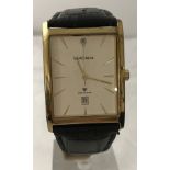 A gents Sekonda leather strap square face wristwatch.