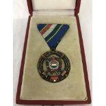 A boxed Hungarian Merit medal for Brotherhood in Arms.