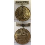 A gilt commemorative medal of James II. By Dassier.