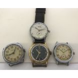 4 military mechanical watches to include one with brown leather strap.