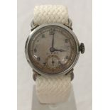 A 1940's gold and steel coloured Military dress watch by Crusade.