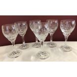 A set of 6 Villeroy And Boch wine glasses with etched floral decoration.