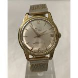 A vintage MuDu gents doublematic 25 jewels 10ct gold plated wristwatch.
