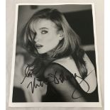 A sign photo of actress Rebecca De Mornay.