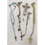 A small collection of religious jewellery items.