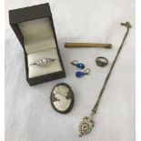 A small collection of costume and silver jewellery.