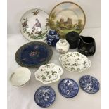 A box of assorted vintage ceramics.