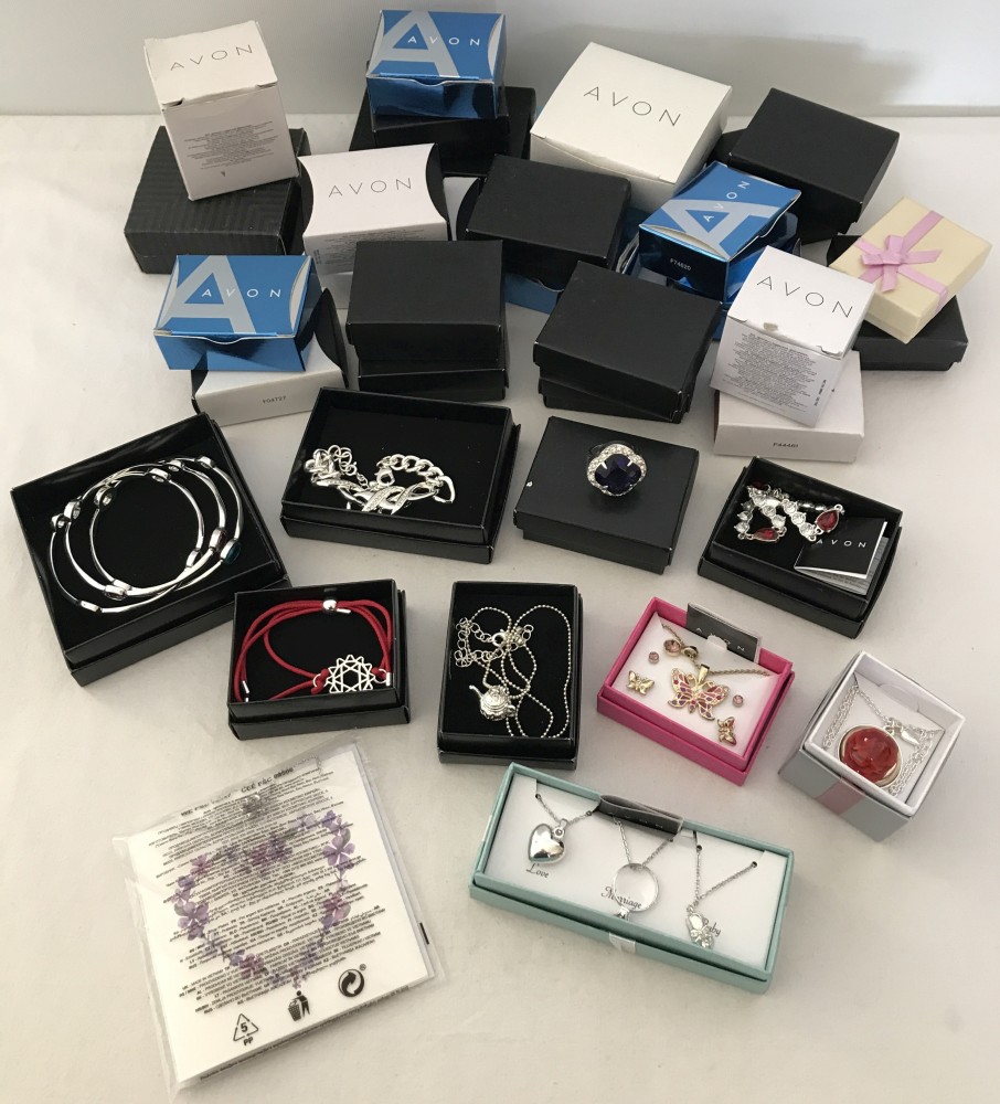 Approx. 35 boxed and packaged items of Avon costume jewellery.