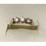 A 14ct gold diamond trilogy ring. Prong set round cut diamonds. Hallmarked 585.