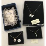 4 boxed costume jewellery necklaces.