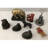 A small collection of metal animal figurines.