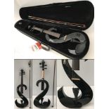 A cased Stagg S shaped electric violin. Complete with bow.