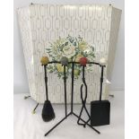 A 1950's - 60's retro metal folding firescreen with floral decoration.