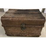 A vintage 2 handled tin trunk.