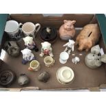 A box of assorted ceramics.