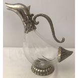 A Silea Silver plated and glass duck shaped claret jug.
