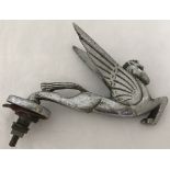 A vintage Pegasus winged horse car mascot.