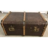 A vintage wooden banded travellers trunk.