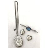 A small collection of silver jewellery items.