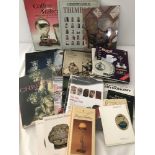 A collection of reference books on a variety of antiques & collectables.