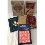 A small collection of books on militaria.