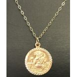 A 9ct gold St Christopher pendant and chain.