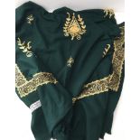 A Large Bottle green Kashmir shawl with gold thread decoration throughout.