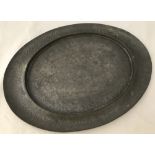 An Arts & Crafts Tudric oval tray in pewter, marked to underside and numbered 0551.