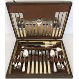 A wooden cased canteen of silver plated cutlery.