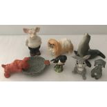 A small collection of ceramic animal figurines.